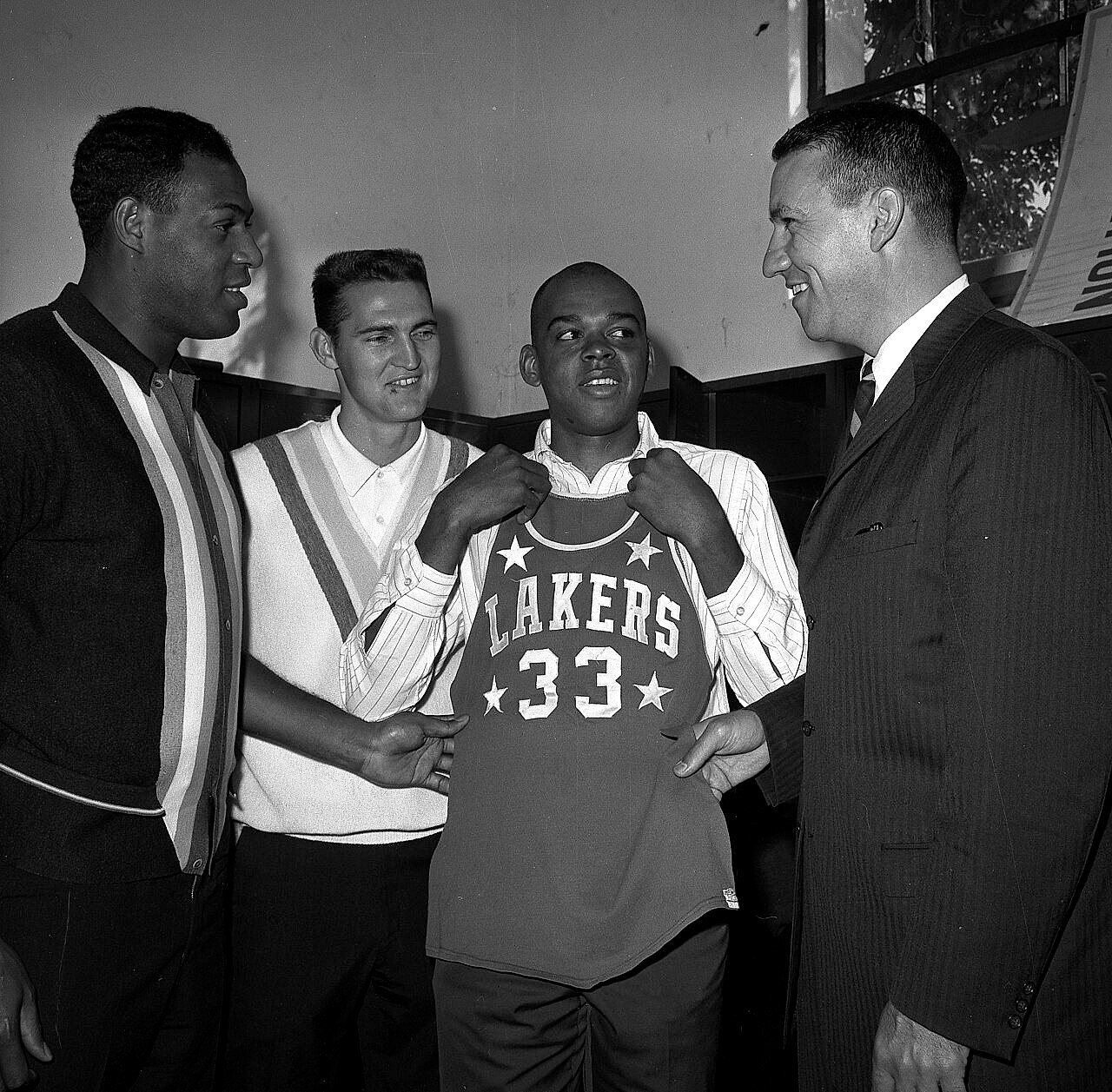 Elgin Baylor with Jerry West, Walt Hazzard, and coach Fred Schaus, Los Angeles Lakers, 1964