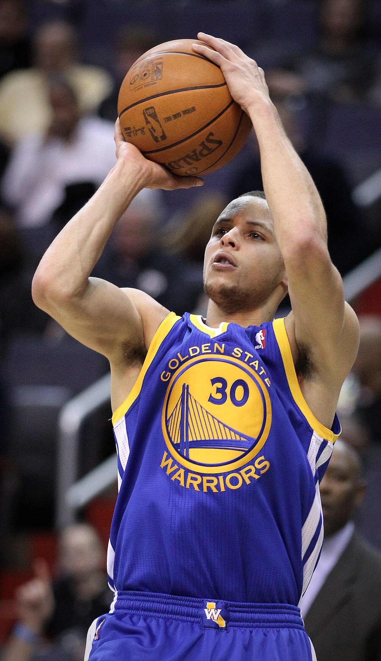 Stephen Curry shooting a three-pointer